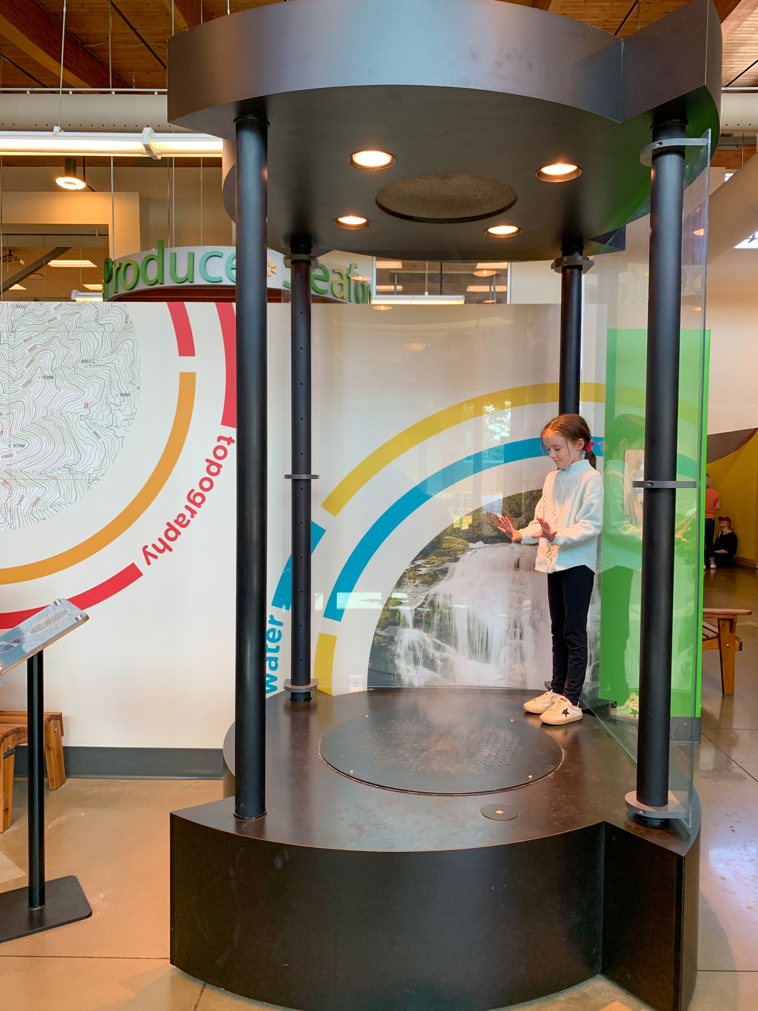 Arkansas kid blogger, Norah, tests out a weather station at Scott Family Amazeum