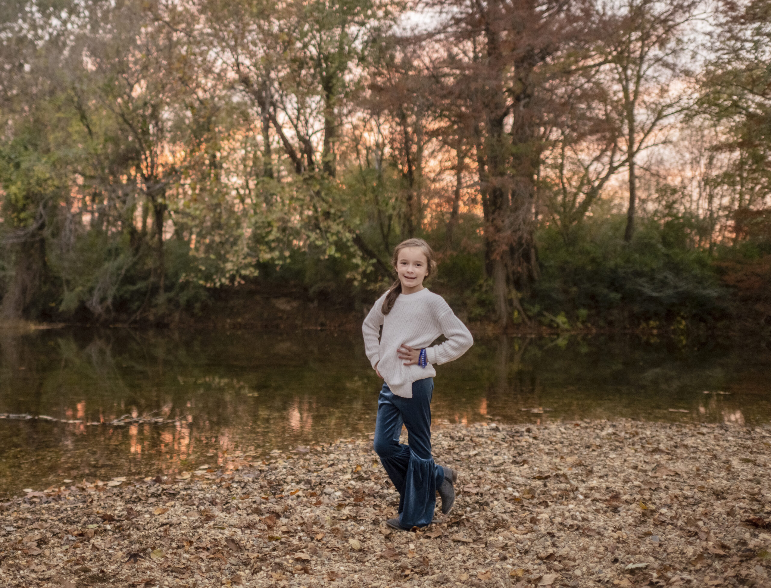 Arkansas kid blogger, Norah, posing in Benton at the Saline River