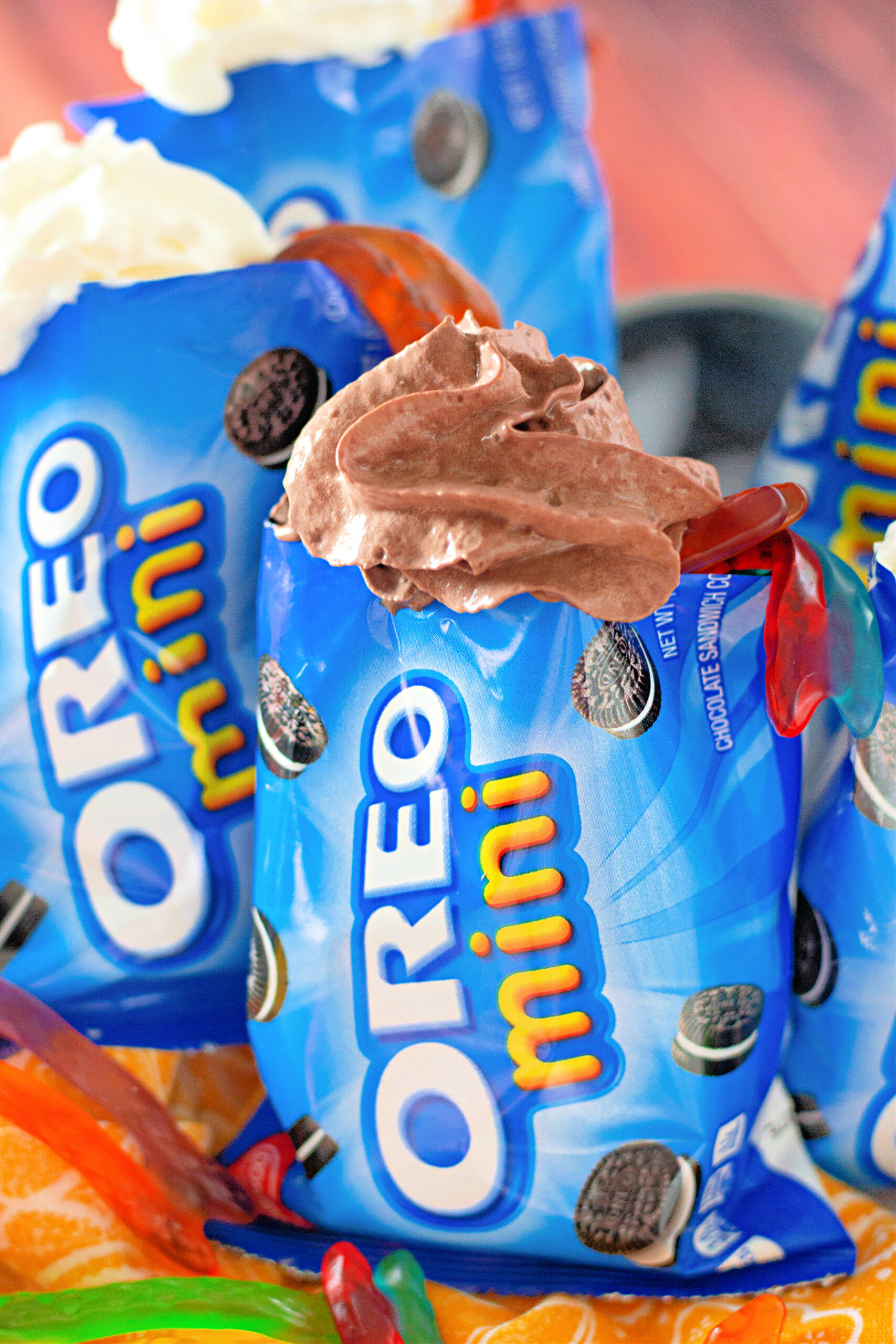 Walking Oreo dirt pudding with gummy worms for a dirt and worms dessert