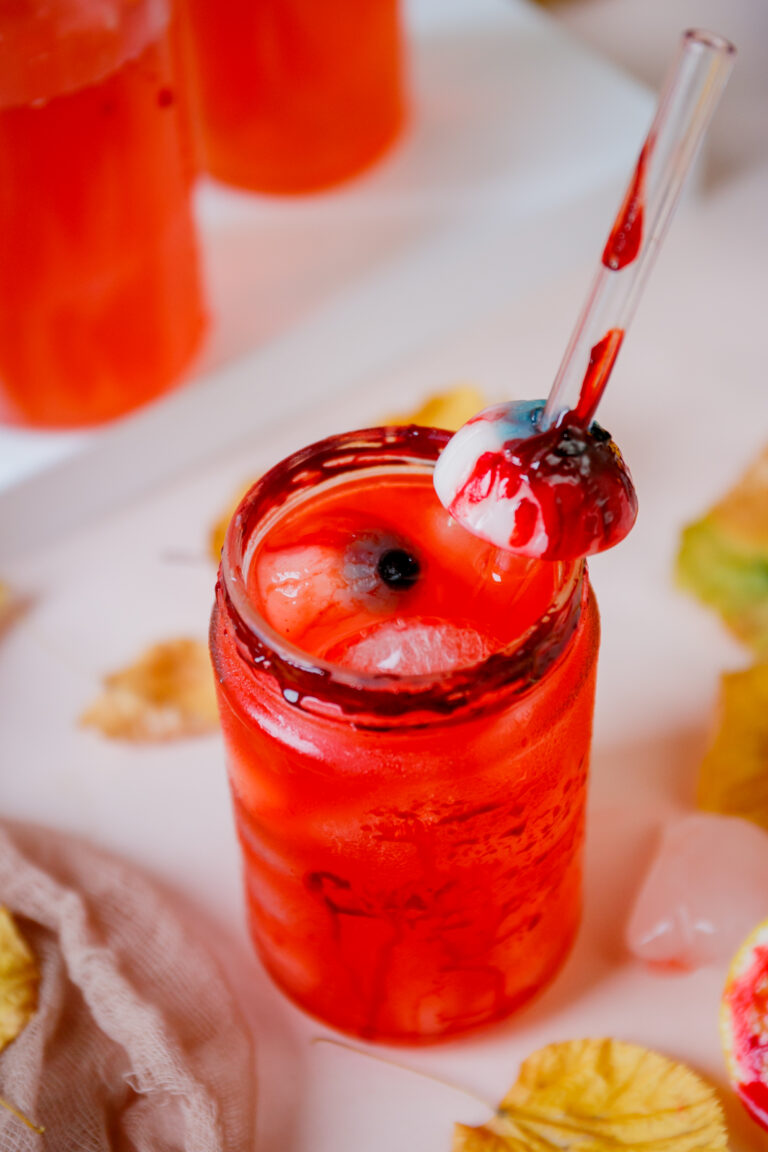 Halloween drink with eyeballs and straw