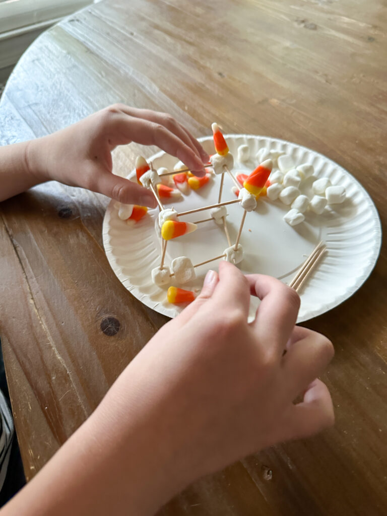 Candy Corn STEM tower on paper plate