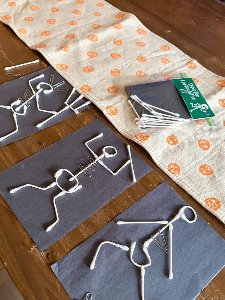 DIY skeleton STEM kits for Halloween spread out on table