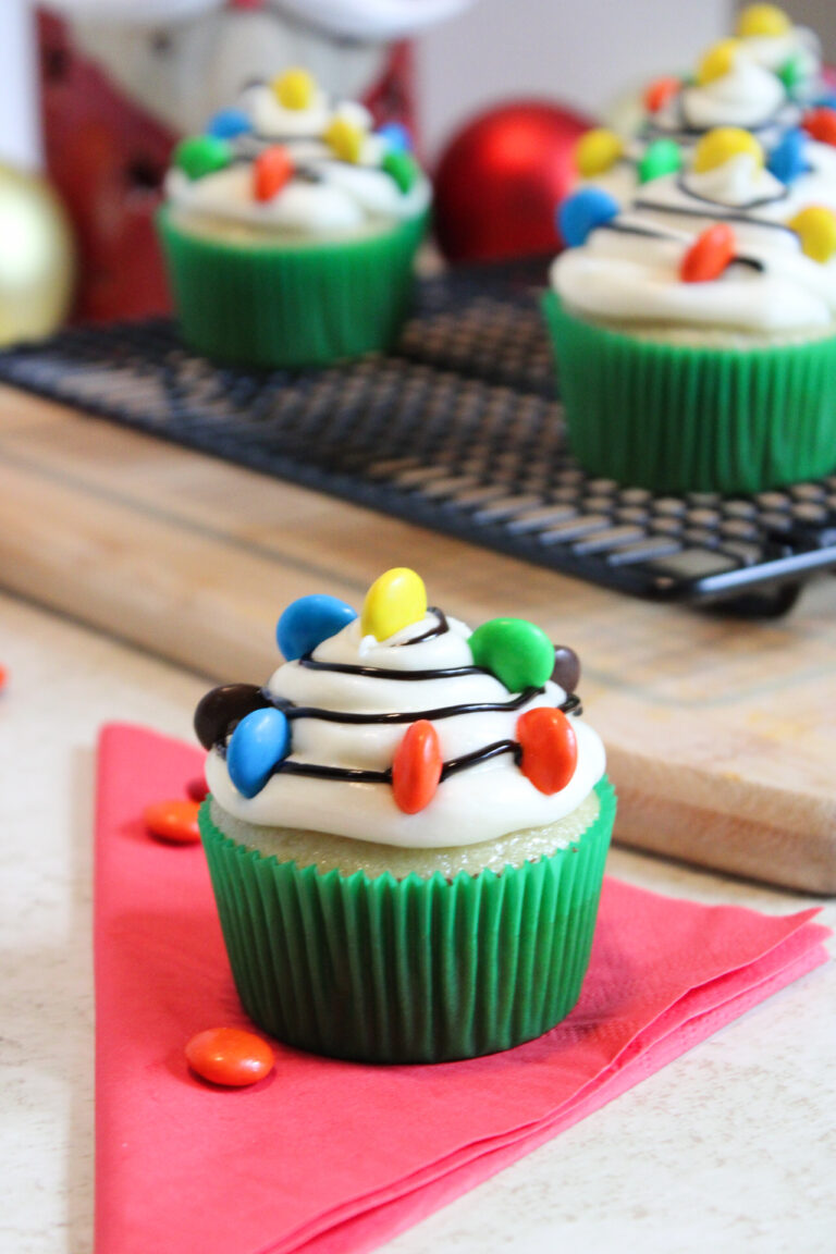Christmas light cupcake on red napkin