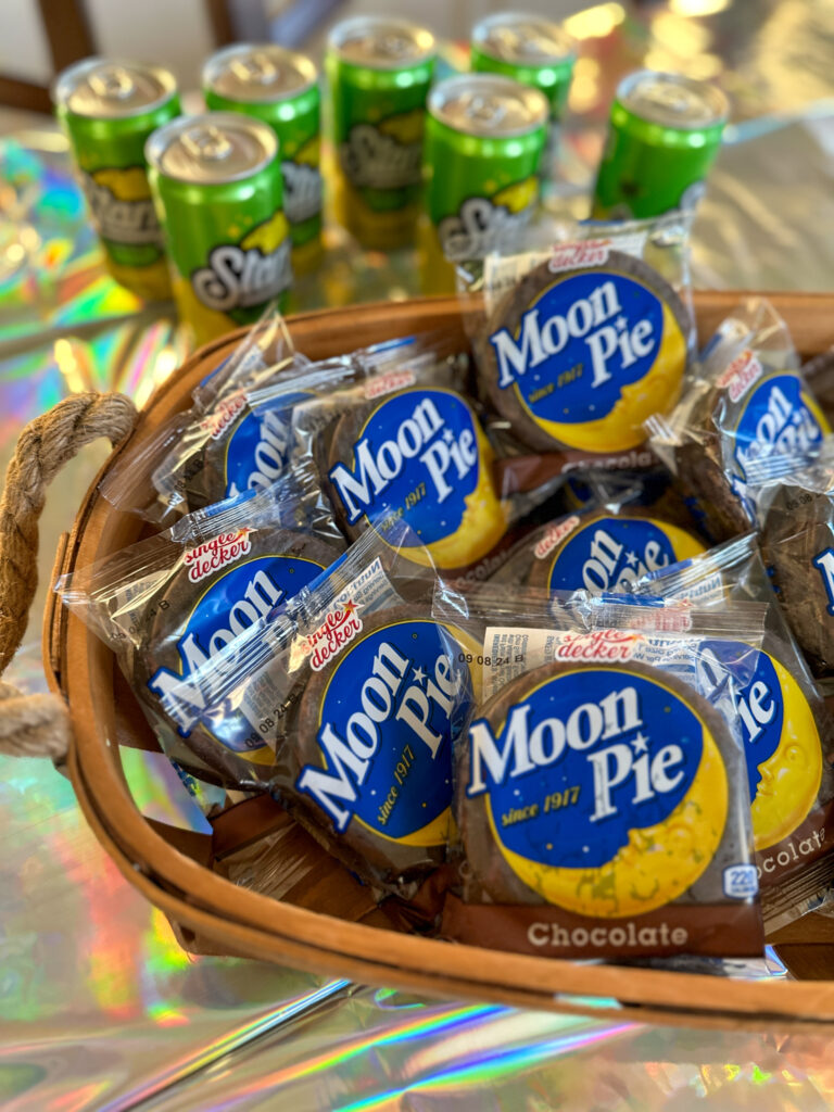 snacks for a moon and stars party in a wooden basket
