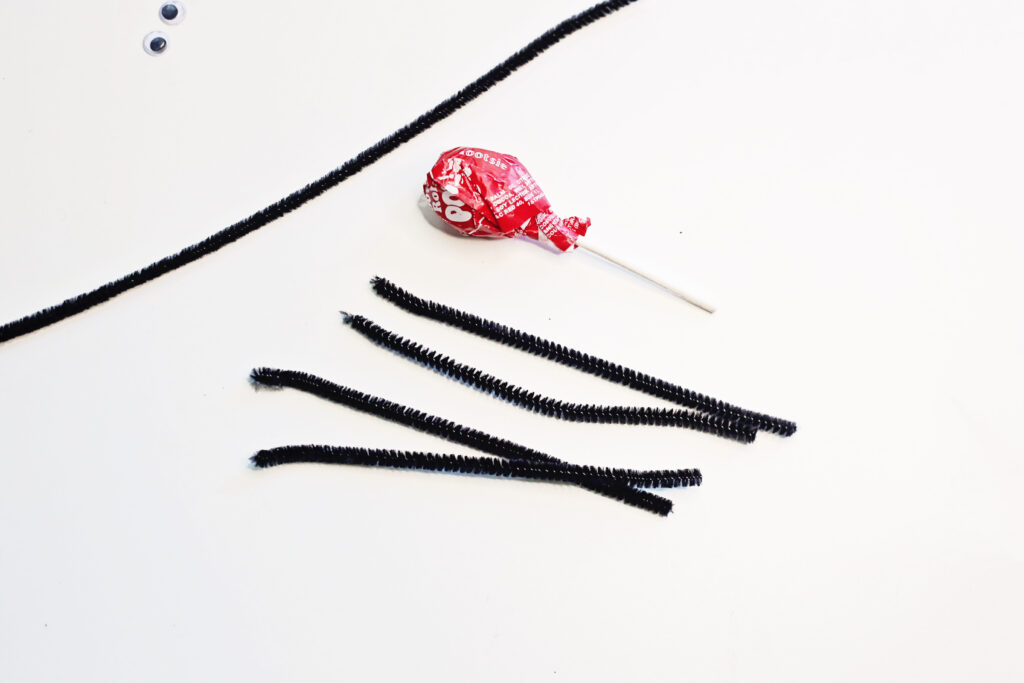 pipe cleaner halves on a white counter