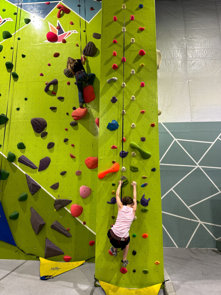girls climbing wall in Fort Smith