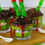 zombie finger dirt cups on a serving tray