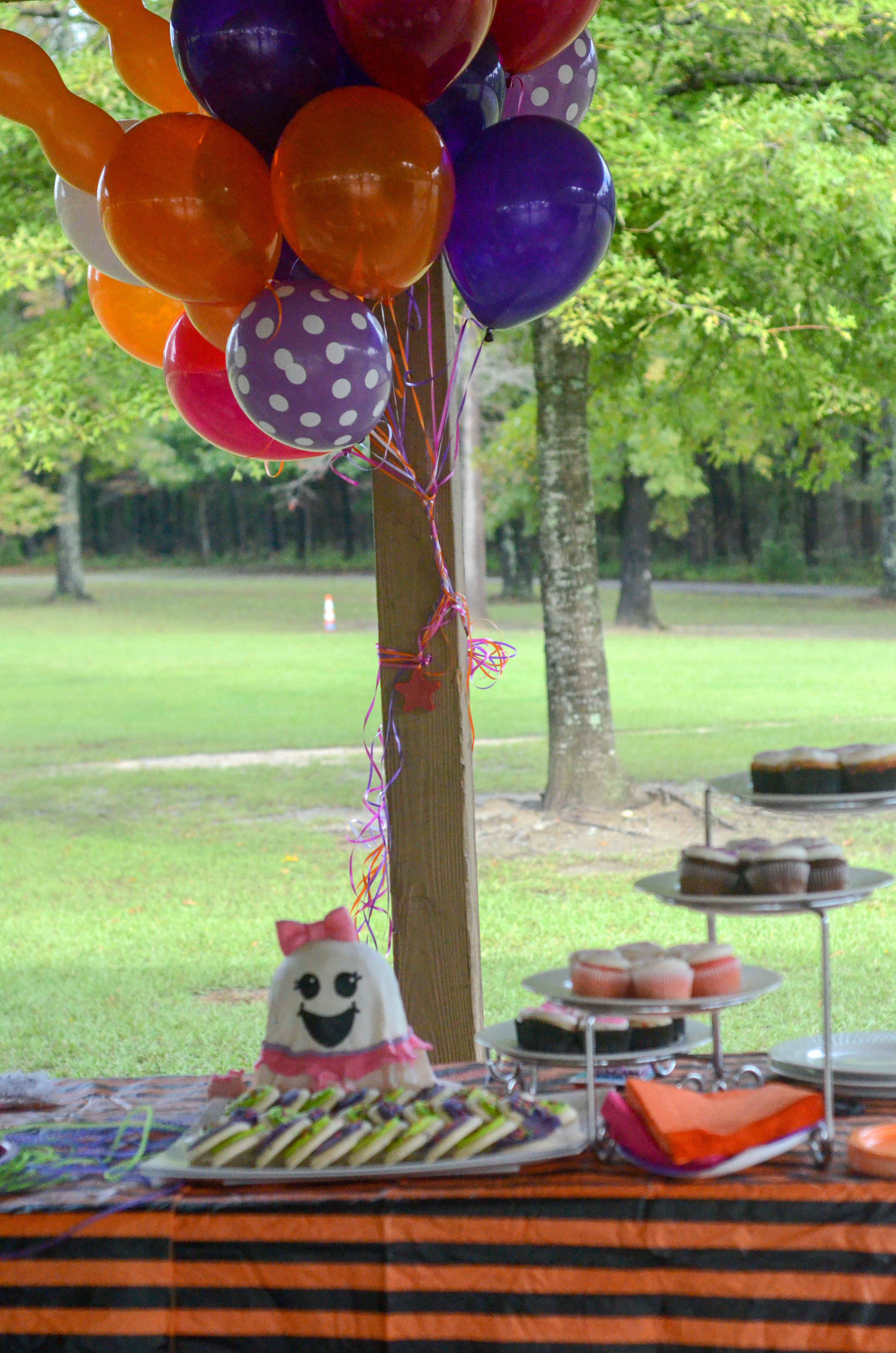 BOO-llerina birthday cake on table for creative Halloween birthday party ideas