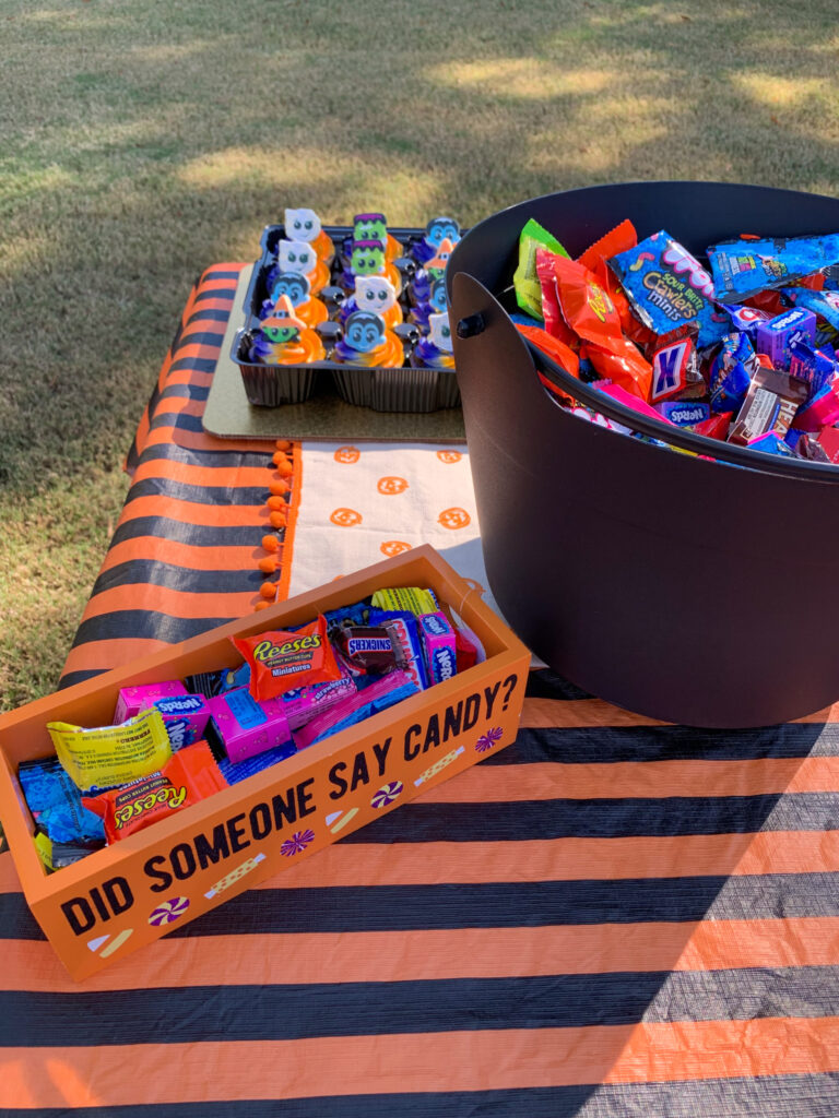 buckets of candy for candy Halloween party table